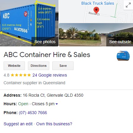 ABC Shipping container depot with a sign on it